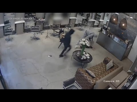 Video: 2 men beat, rob victim of watch at shop on Melrose Avenue