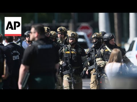 Video: Florida SWAT team sniper kills man who took people hostage at bank