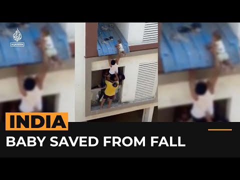 Video: Baby rescued from apartment roof’s edge in India | #AJshorts