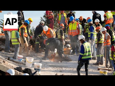 Video: Rescuers search for missing dozens after building collapse in South Africa