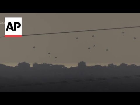 Video: Aid drops into Gaza and smoke seen from direction of Rafah