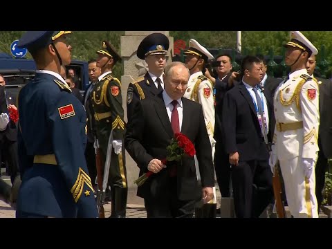 Video: Russian President Putin lays flowers at WWII memorial in Harbin during state visit to China