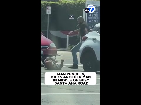Video: Man punches, kicks another man in middle of busy Santa Ana road